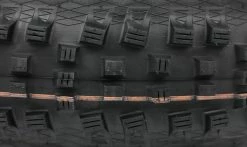 Pneu Schwalbe Magic Mary - Addix Soft - Super Trail - Tubeless Easy -Pneus Vtt Soldes Pneu Schwalbe Magic Mary Addix Soft SnakeSkin Apex Tubeless Easy macro 1235x735